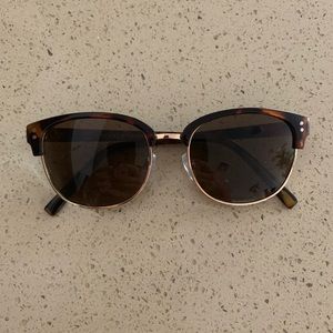 Tortoise shell glasses.